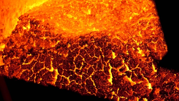 A close-up of the glowing interior of a furnace