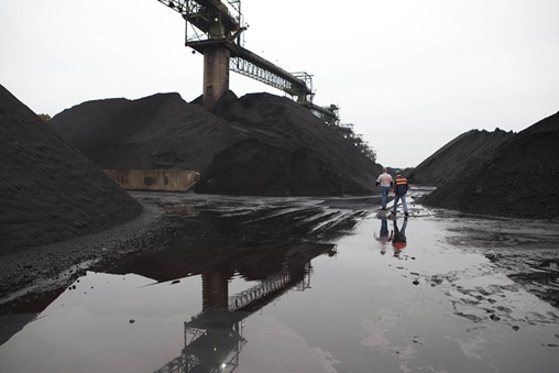 Piles of coal at a mining site