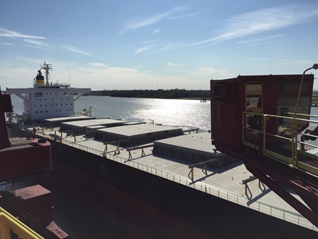 Large cargo vessel moored at the harbor