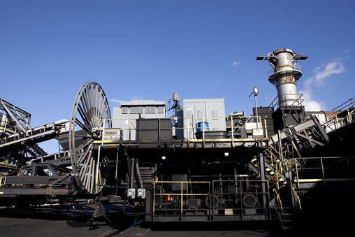 Large industrial machine with a crane on top